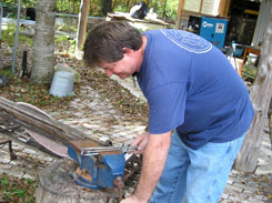 Chris Ring heating the crankshaft to bend it