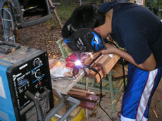 Me trying to weld.  The weld did not hold